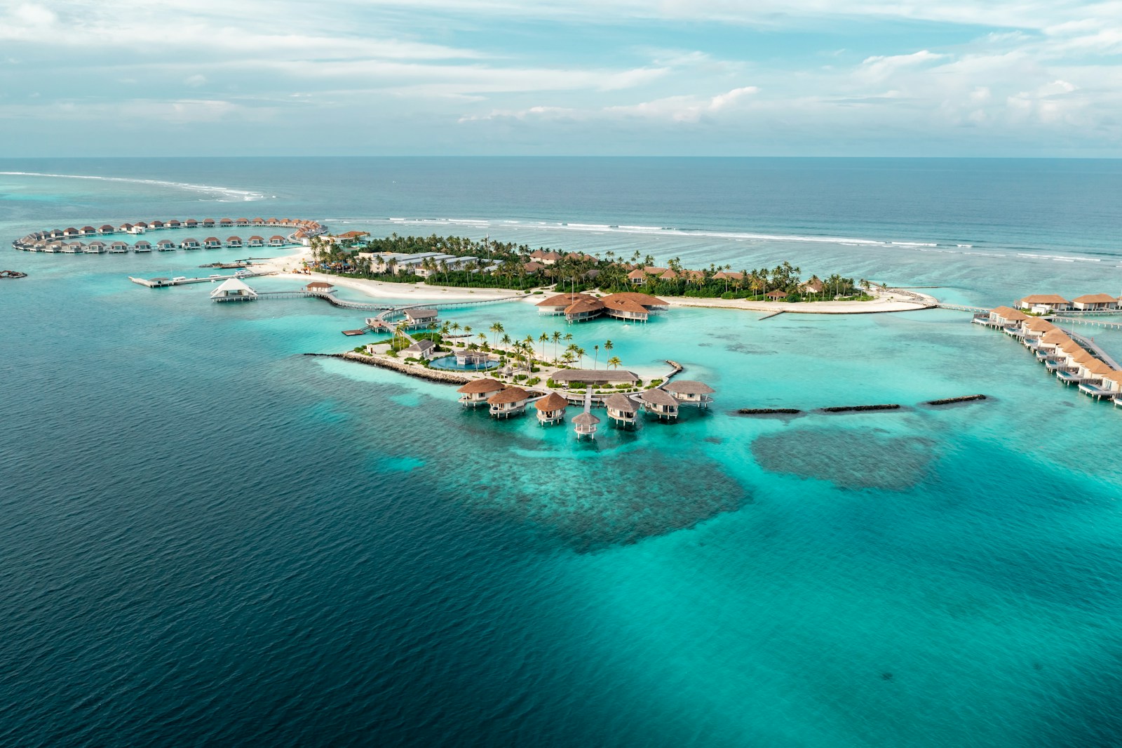 an aerial view of an island in the middle of the ocean